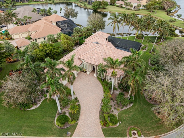 drone / aerial view with a water view