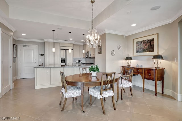 dining area with an inviting chandelier, light tile patterned floors, and crown molding