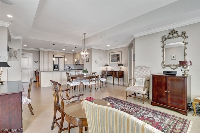 interior space featuring an inviting chandelier and a raised ceiling