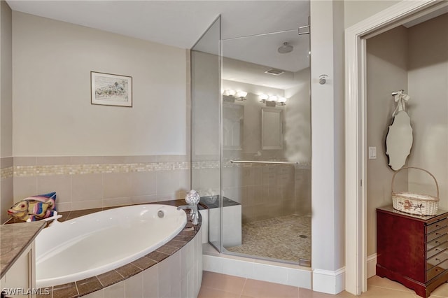 bathroom featuring vanity, tile patterned flooring, and independent shower and bath