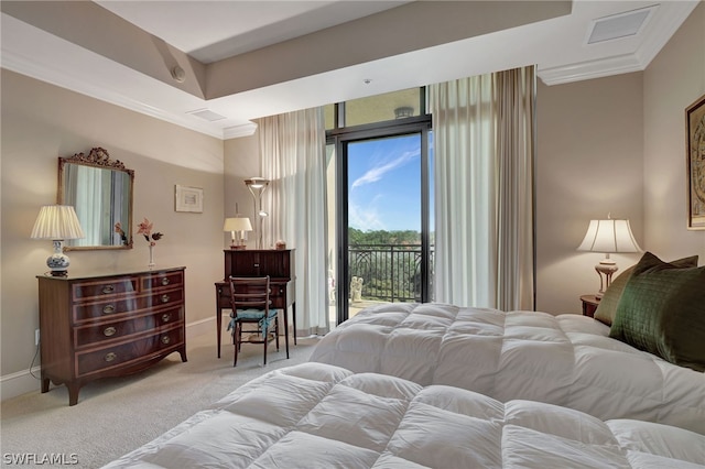 carpeted bedroom featuring crown molding and access to outside