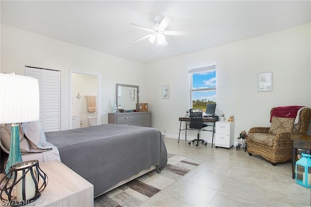 bedroom with ceiling fan and ensuite bathroom