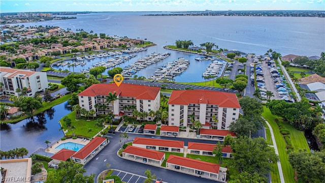 drone / aerial view with a water view