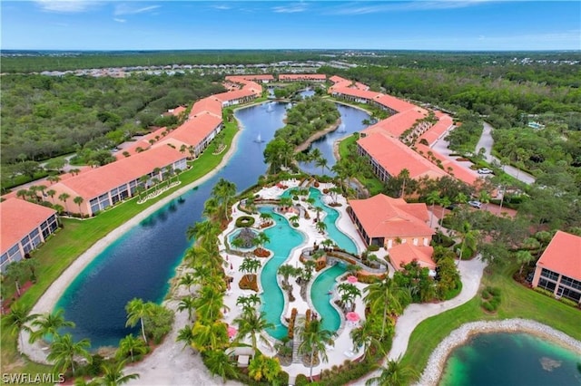 birds eye view of property featuring a water view