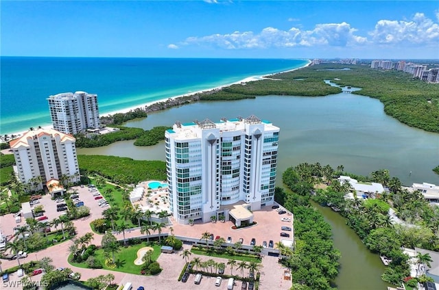 bird's eye view with a water view and a view of the beach