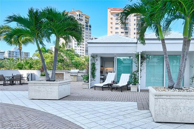 view of patio featuring a grill and exterior kitchen