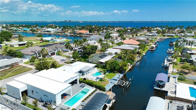 drone / aerial view with a water view