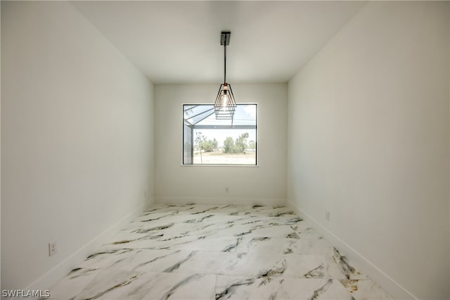 unfurnished dining area with tile patterned floors