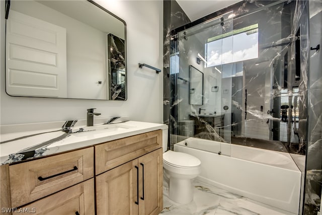 full bathroom with bath / shower combo with glass door, tile patterned floors, toilet, and vanity