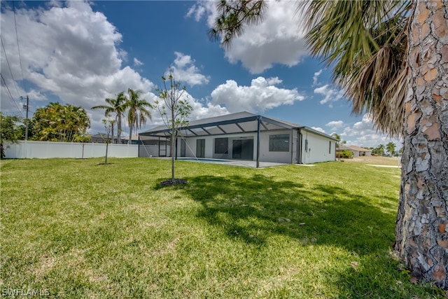 view of yard with a lanai