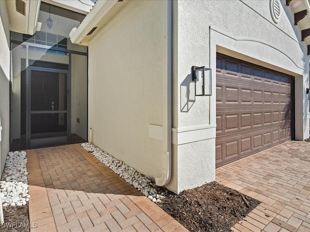 entrance to property with a garage