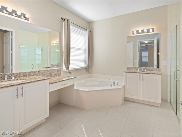 bathroom with vanity, shower with separate bathtub, and tile patterned flooring