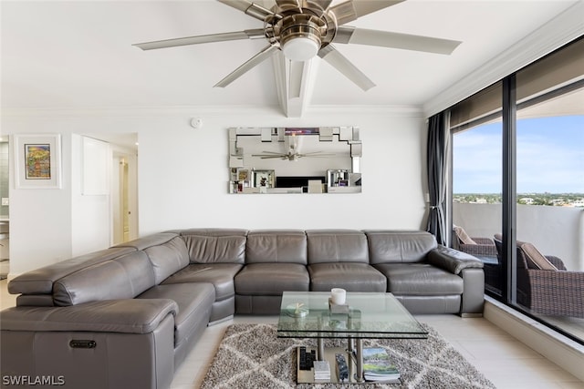 living room with crown molding and ceiling fan