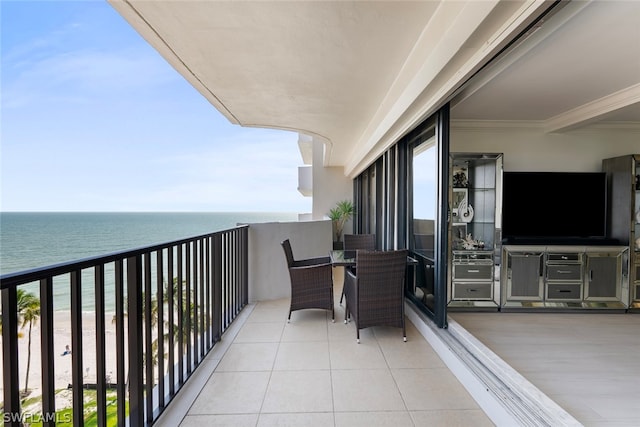 balcony featuring a water view