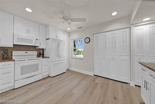 kitchen featuring tasteful backsplash, white appliances, light wood-style flooring, and white cabinets