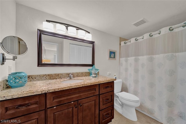 bathroom with toilet, a shower with shower curtain, vanity, visible vents, and tile patterned floors