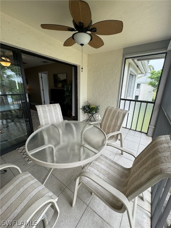 interior space featuring ceiling fan