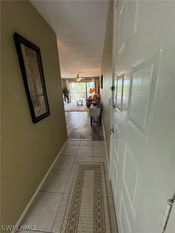 hallway featuring hardwood / wood-style flooring