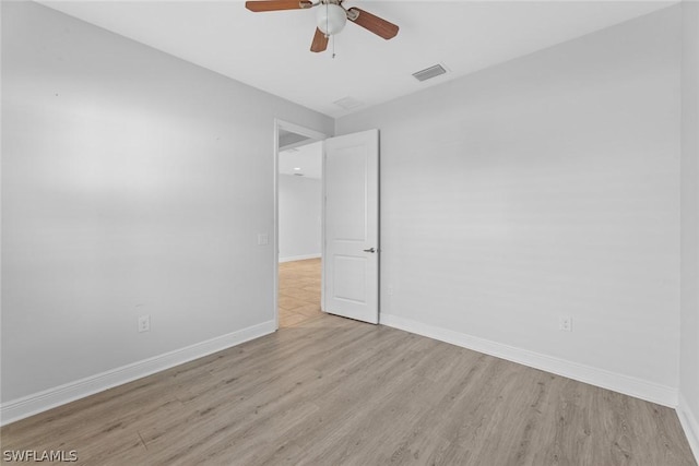 unfurnished bedroom with light hardwood / wood-style floors and ceiling fan