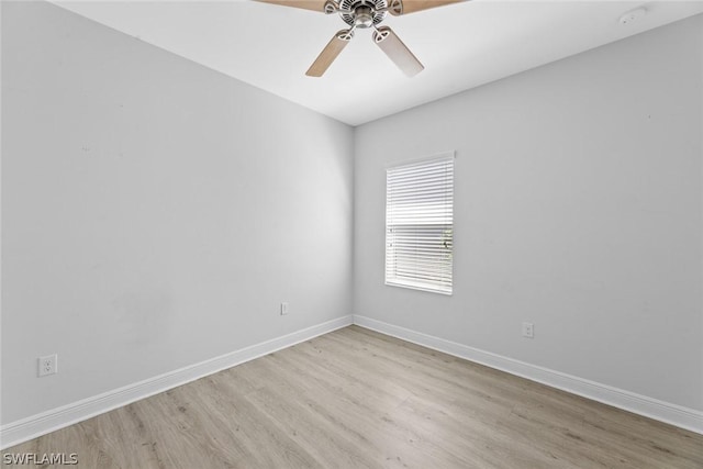 unfurnished room with ceiling fan and light wood-type flooring