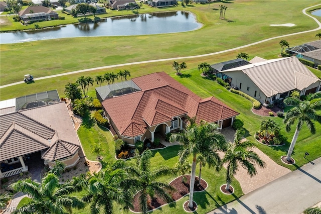 bird's eye view featuring a water view and a residential view