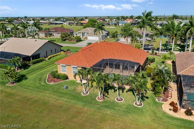 birds eye view of property with a residential view