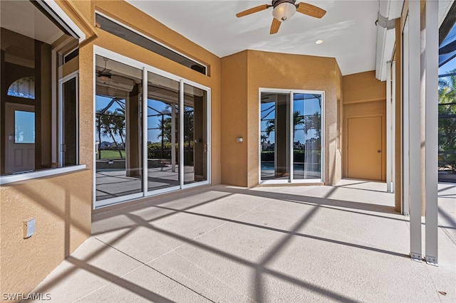 view of patio / terrace featuring ceiling fan