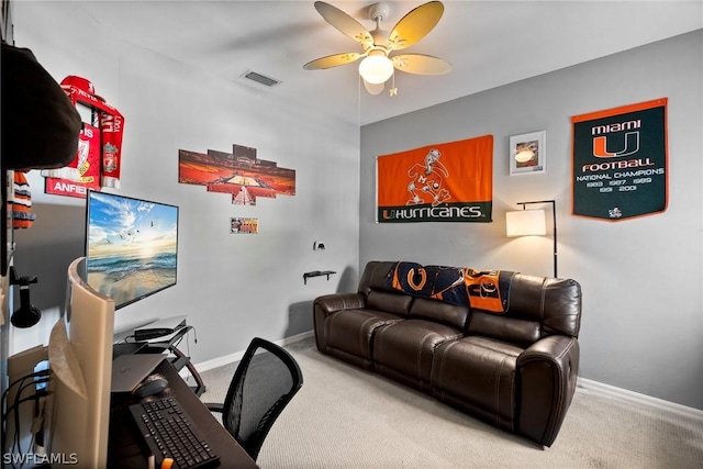 office space with ceiling fan and carpet floors
