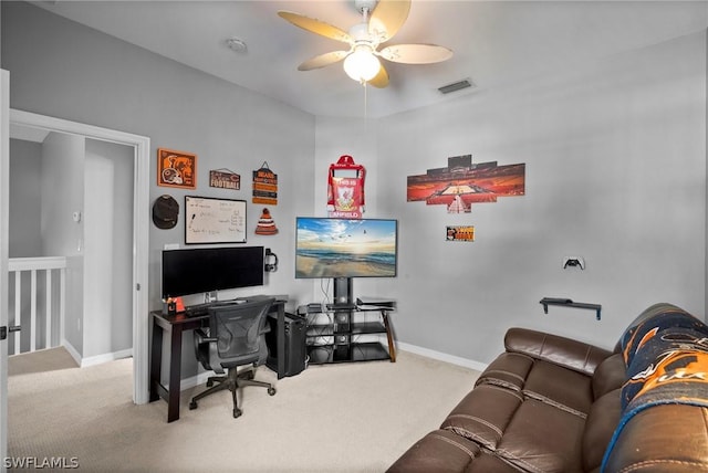 home office featuring carpet and ceiling fan