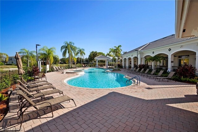 view of pool featuring a patio