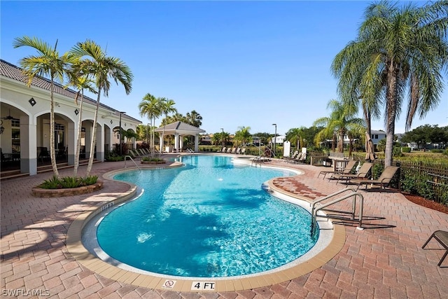 view of swimming pool featuring a patio