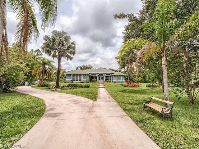 view of front of house with a front lawn