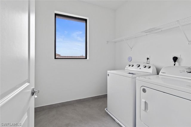 laundry area featuring independent washer and dryer