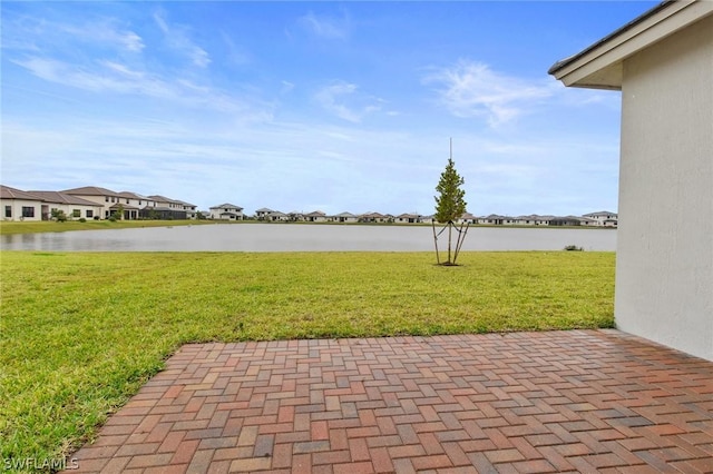 view of patio / terrace with a water view