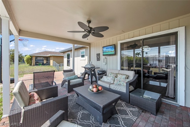 view of patio with ceiling fan and an outdoor hangout area