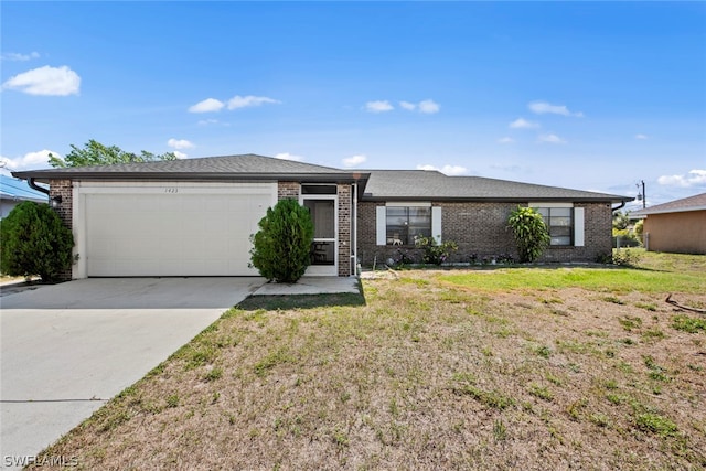 single story home with a garage and a front yard