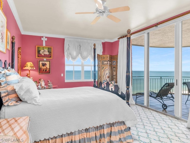 bedroom with access to outside, a water view, carpet flooring, ceiling fan, and ornamental molding