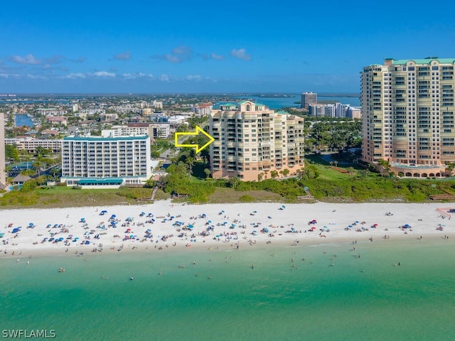 aerial view featuring a water view and a view of the beach