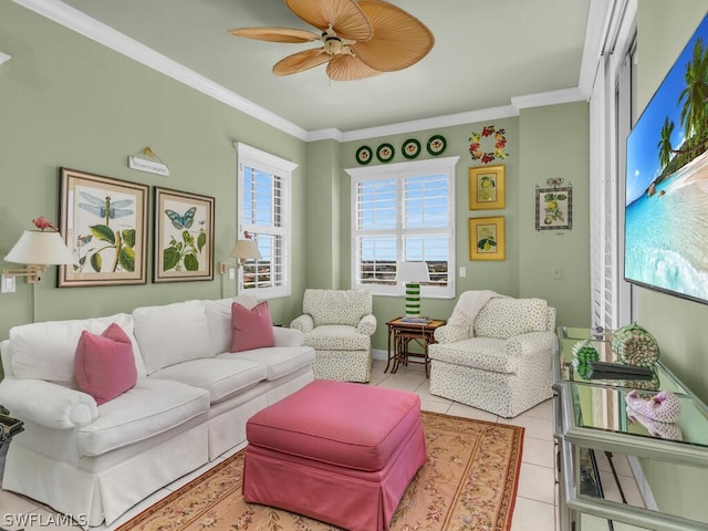 tiled living room featuring ceiling fan and crown molding