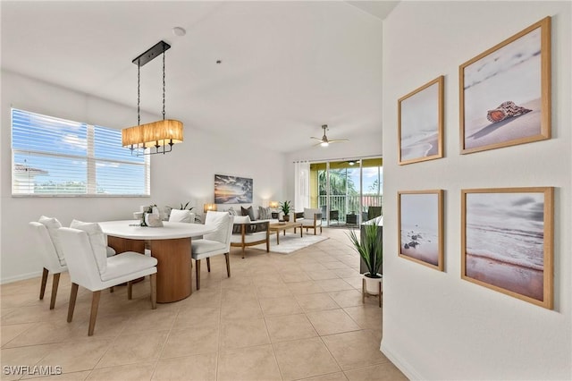 dining space with an inviting chandelier and light tile patterned floors