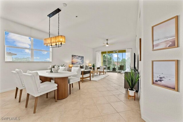 dining room with ceiling fan and light tile patterned floors