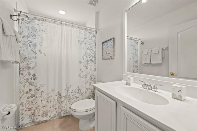 bathroom featuring a shower with shower curtain, vanity, tile patterned flooring, toilet, and visible vents