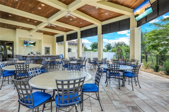 view of patio featuring ceiling fan