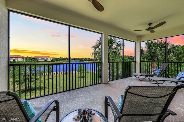 2375 Montserrat Ln Unit 202, Naples, FL 34120 - sunroom / solarium featuring a water view and ceiling fan