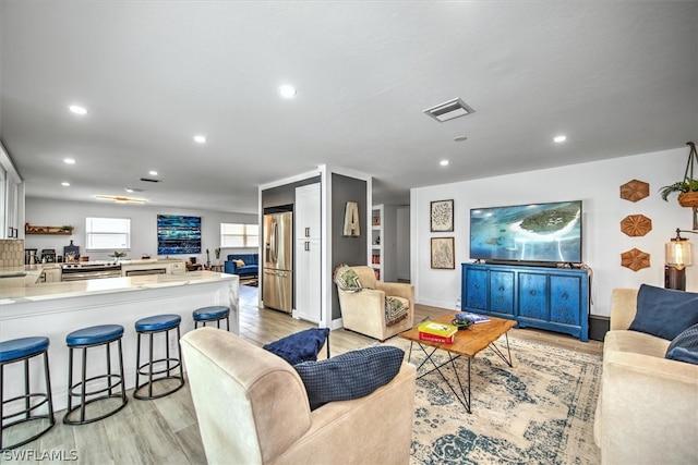 living room featuring light hardwood / wood-style flooring