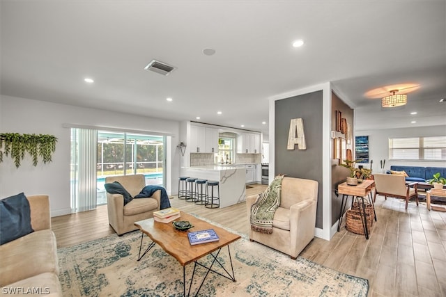 living room featuring light hardwood / wood-style floors