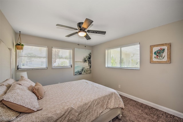 bedroom featuring ceiling fan and carpet floors