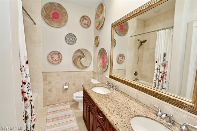 full bathroom featuring tile flooring, shower / bath combo, toilet, and tile walls