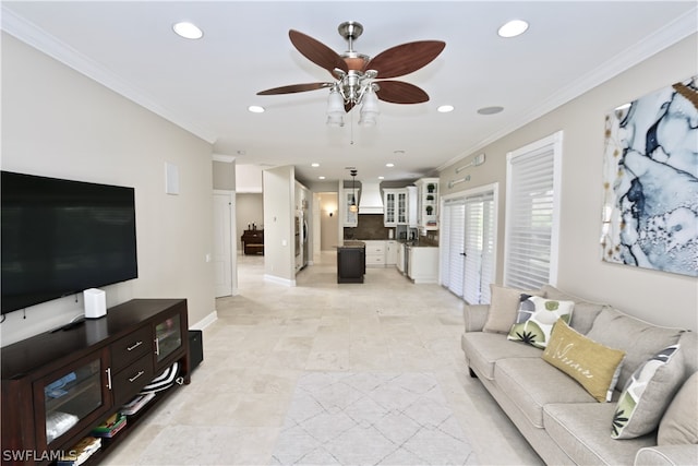 living room featuring crown molding, ceiling fan, and light tile floors