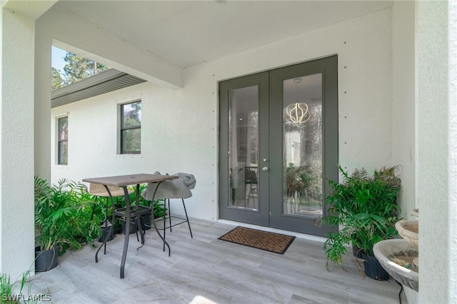 property entrance featuring french doors